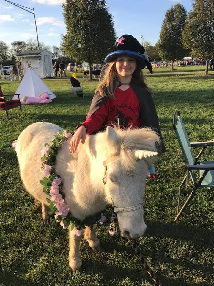 Silas with a unicorn