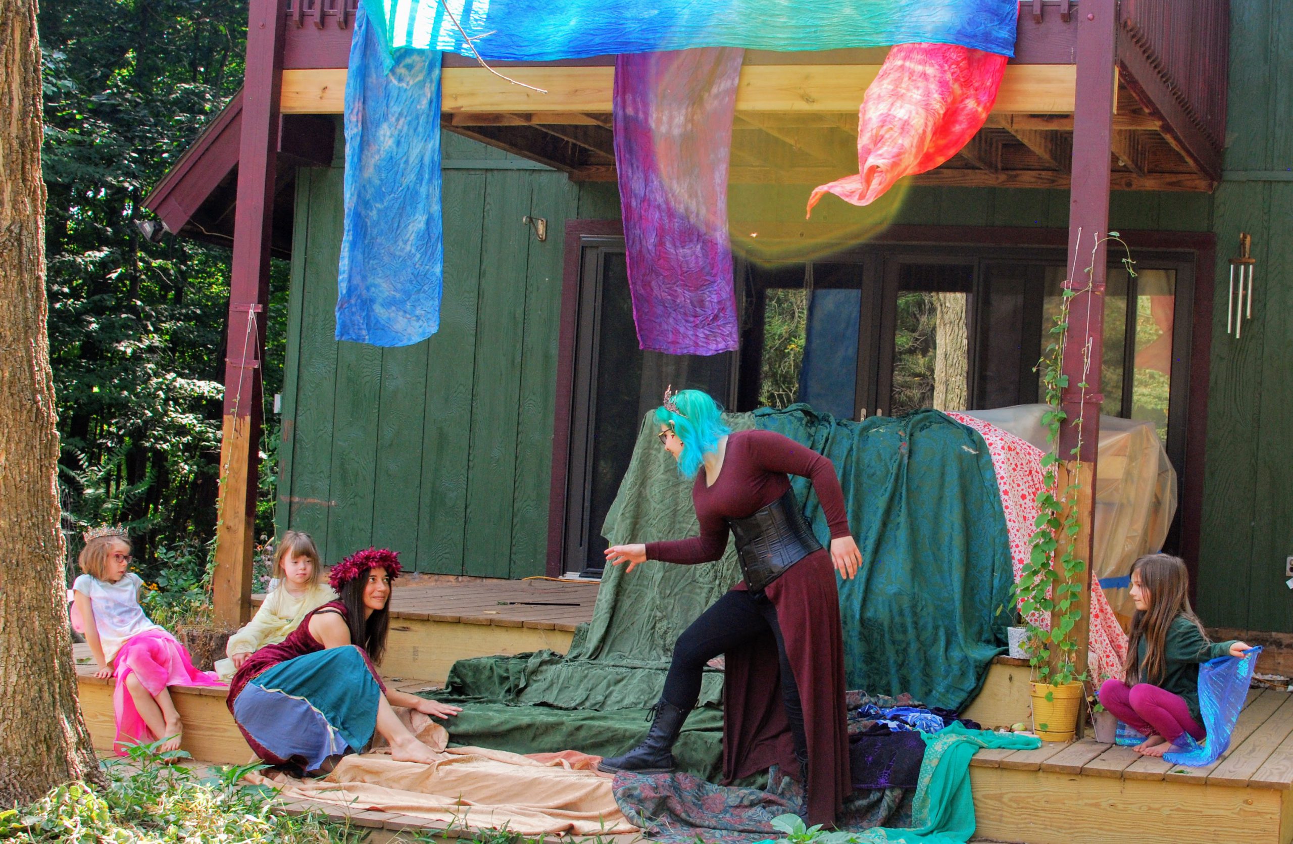 friends staging a random fairy scene on my porch/stage